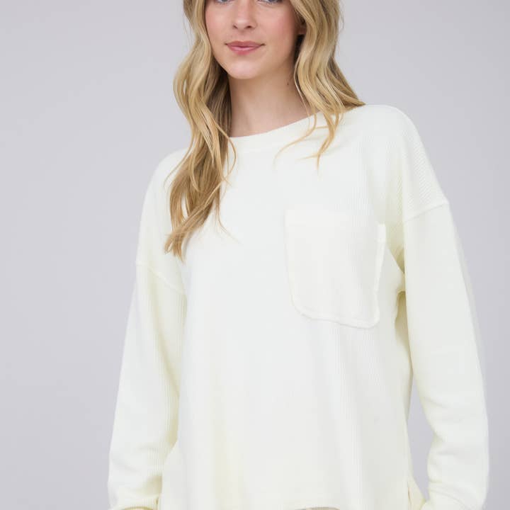 WASHED POCKET DETAIL LONG SLEEVE RIB KNIT TOP and other Purchase Wholesale patch pocket. Free Returns & Net 60 Terms on Faire trending on Faire.