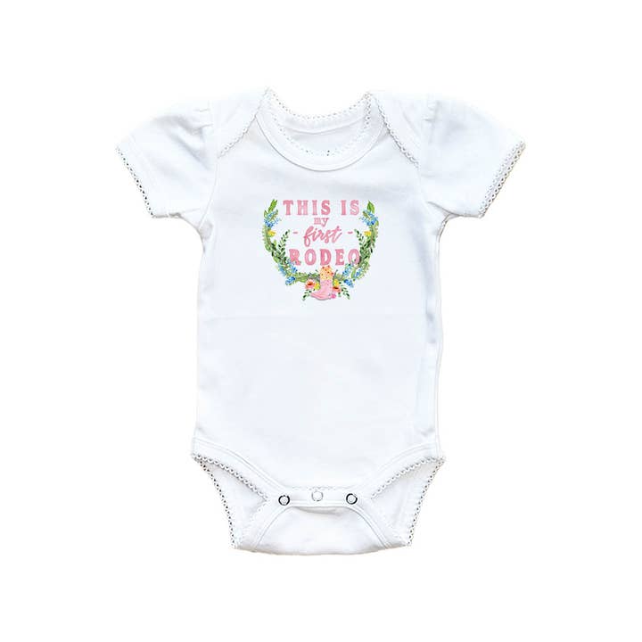 This is My First Rodeo Pink Onesie for wholesale by Knollwood Lane