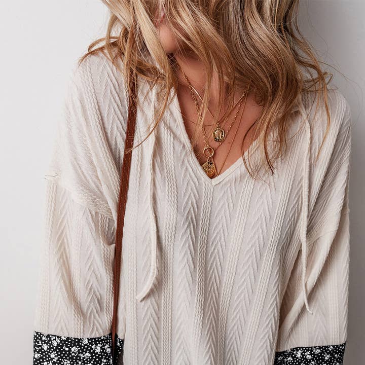 Floral Patchwork Textured Knit Drawstring V Neck Blouse and other Purchase Wholesale bohemian home decor. Free Returns & Net 60 Terms on Faire trending on Faire.