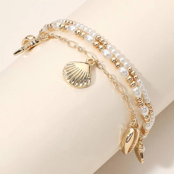 3PCS Starfish Puka Charm Pearl Bead Stretch Layer Bracelets for wholesale by Sensibling Corp.