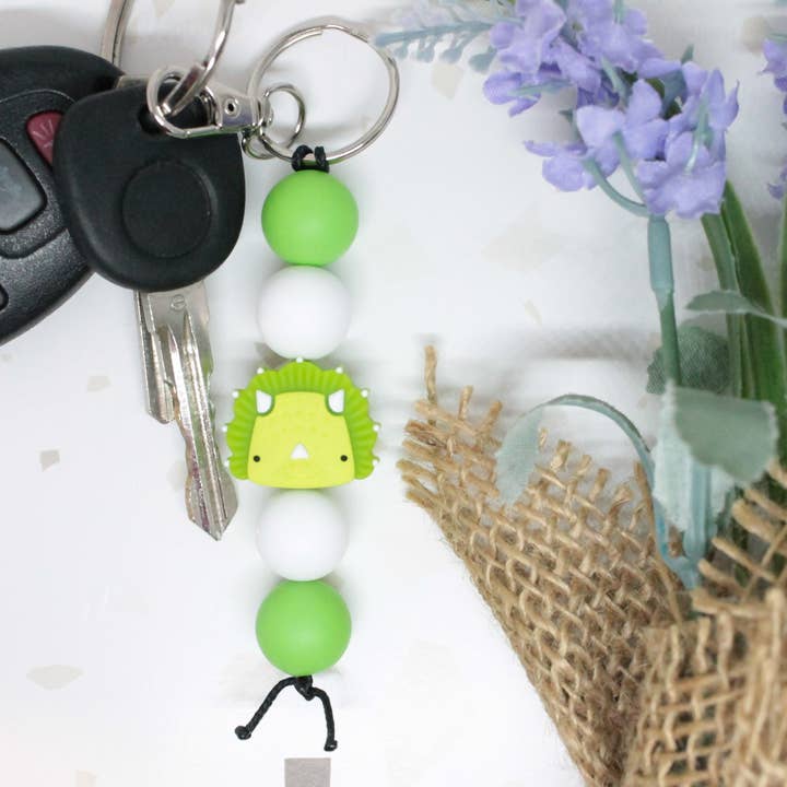 Green Dinosaur Silicone Beaded Keychain for wholesale by Kaysticks.co