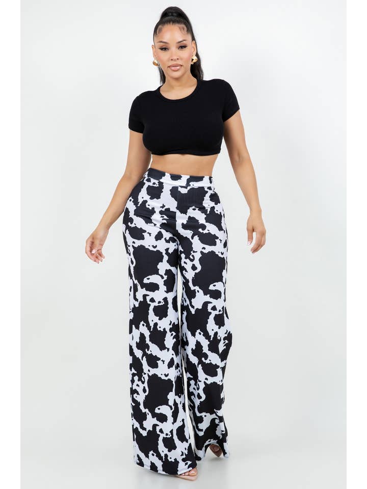 BLACK WHITE B11401 TECHNO CREPE COW PRINT PANTS WITH BACK METAL ZIPPER for wholesale on Faire4