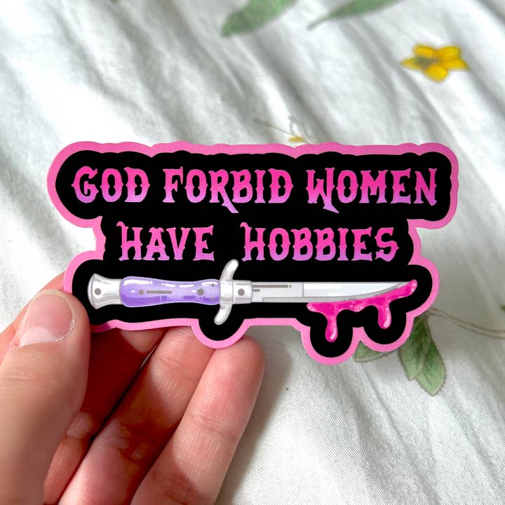 God Forbid Women Have Hobbies Sticker for wholesale by Hollandaize Art