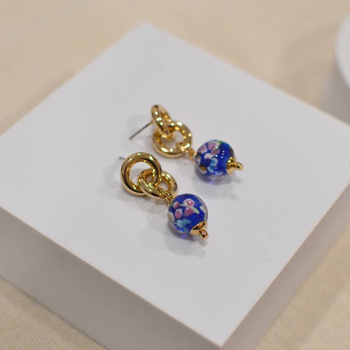 StarryNYC – Großhandel Ohrhänger – Ohrhänger in Kugelform aus Murano-Glas mit elegantem Muster10