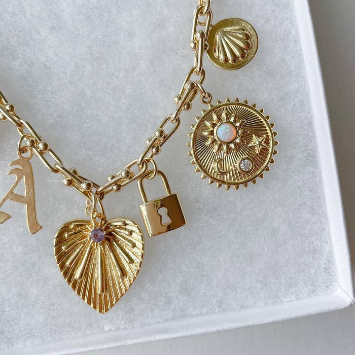 BURSTING HEART CHARM for wholesale by Goldie Charm Bar