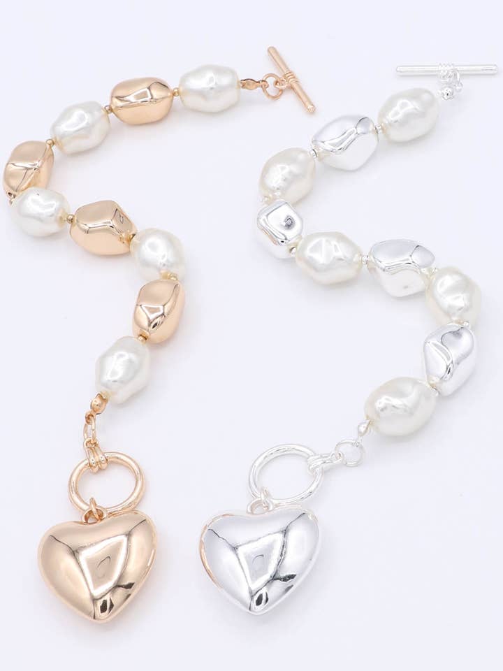 Metallcharmarmband med uppblåst hjärta och lysterpärla för wholesale av Mint & Shine