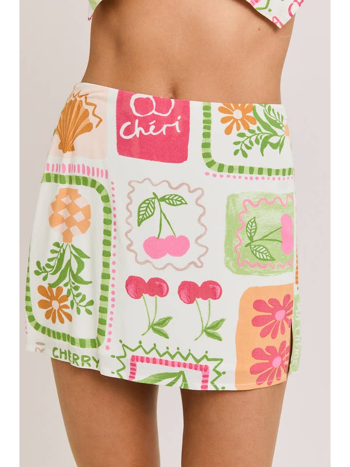 WHITE MULTI BUTTON DOWN SLEEVELESS TOP WITH SLIT MINI SKIRT for wholesale on Faire