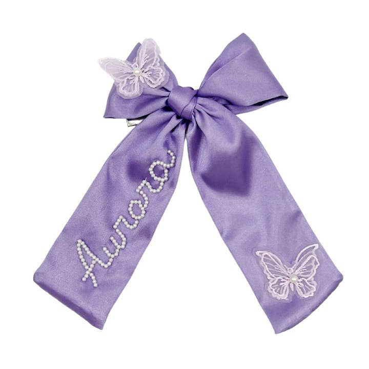 Dark Purple Pearl Butterfly Bow for wholesale by Bebe Theory