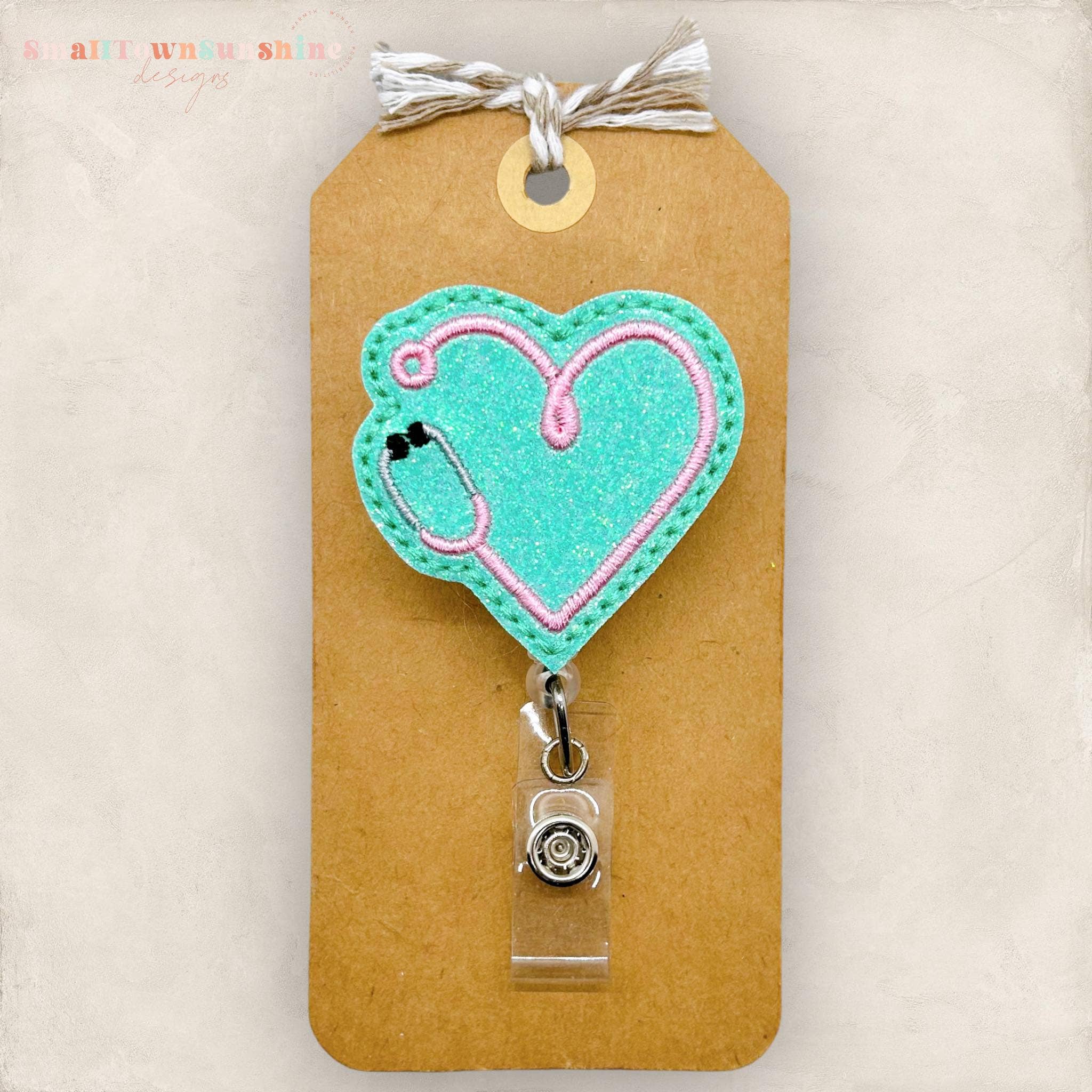 Wholesale Mint & Pink Stethoscope Heart Badge Reel for your store - Faire