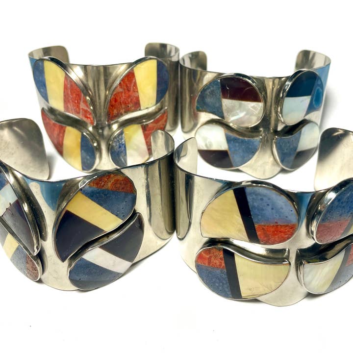 Vintage 1970s Steel Cuff Bracelets – 4 Styles | Paisley Red Coral, Blue Coral, and Mother of Pearl Inlay for wholesale by Whitestone Jewelry Co.