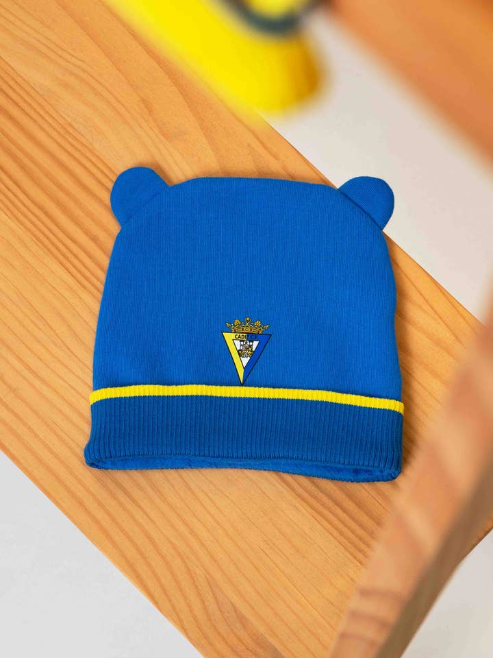 Gorro azul com orelhinhas bebé - Cádiz CF por atacado de Charanga