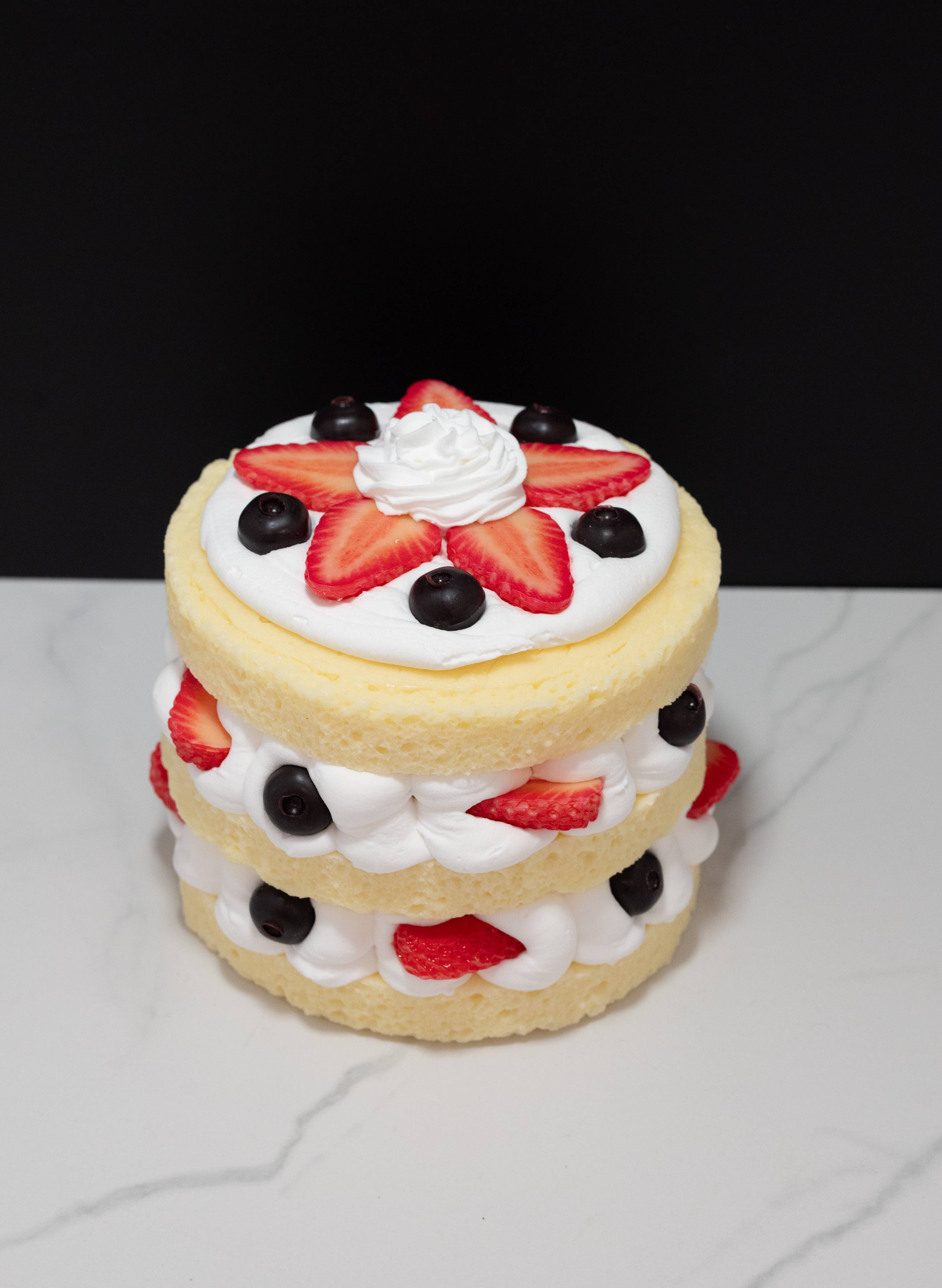 Just Dough It! Fake Foods - Wholesale Decorative Tabletop Object - Fake Triple Layer Vanilla and Berry Cake1