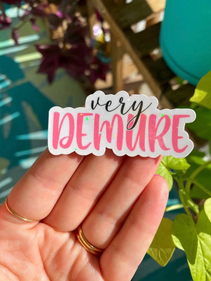 Demure sticker (holographic) for wholesale by Party Like A King