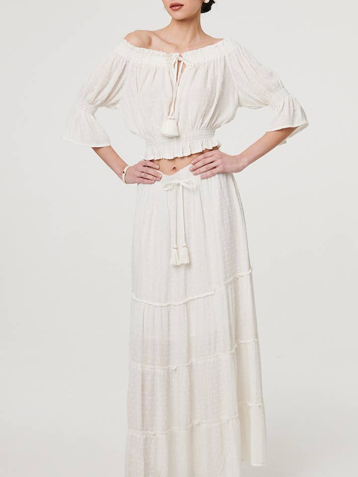 Maxinederdel med struktur, bindebånd i taljen og lag. for engroshandel hos Stellalondon