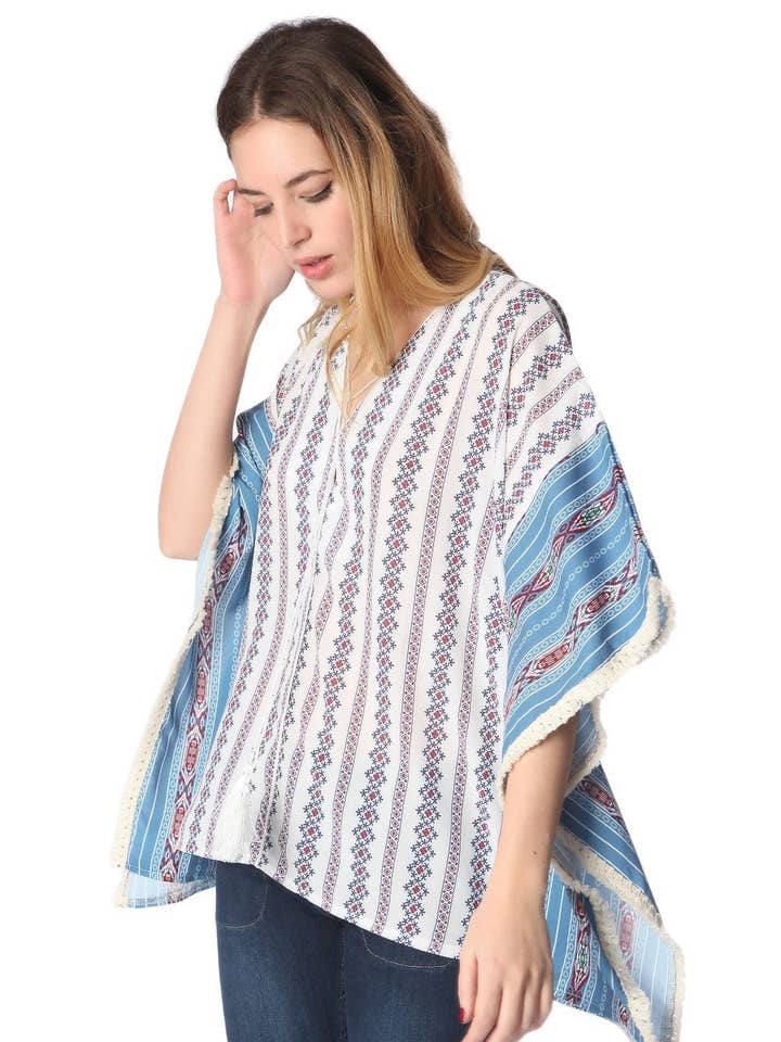 Blue oversized poncho top in tribe print for wholesale by Q2—All Orders:Free Duties for the US,UK,and Canada