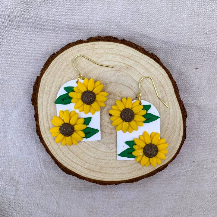 Zonnebloemboog oorbellen van polymeer klei voor wholesale door thehappyfirefly