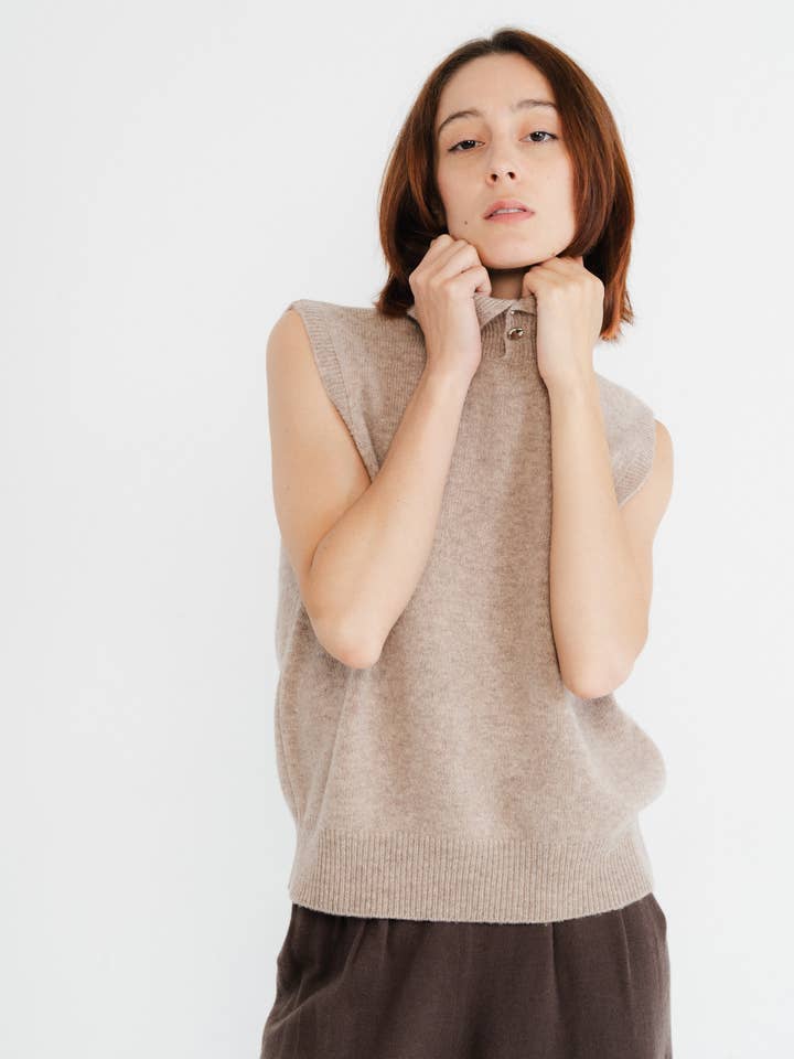 Sleeveless sweater with button-up high collar 100% Wool for wholesale by JULIA PARIS