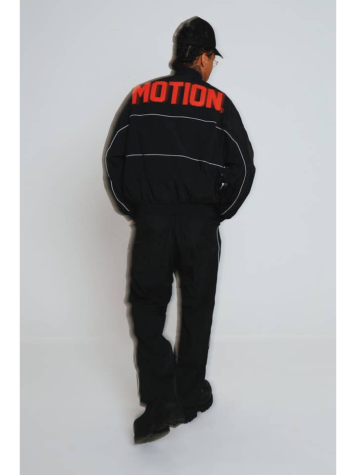 Black Red MOTION Nylon Pants (BRED) for wholesale on Faire14