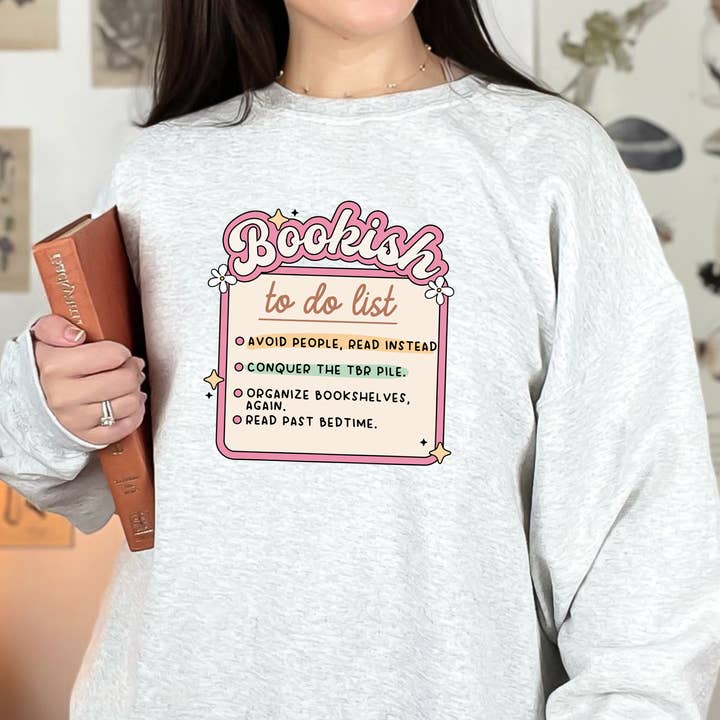 Sweat-shirt col rond "Liste de choses à faire pour les amateurs de livres" pour la vente par Painted Lavender