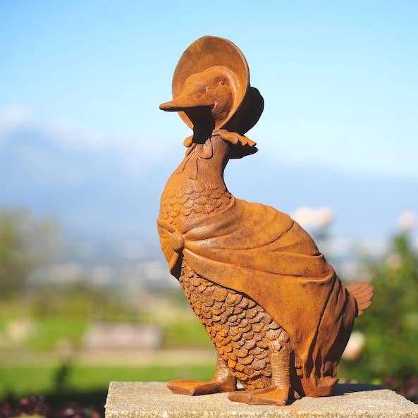Cast Iron Mrs. Duck Sculpture for wholesale by Artisan Metal Art INC