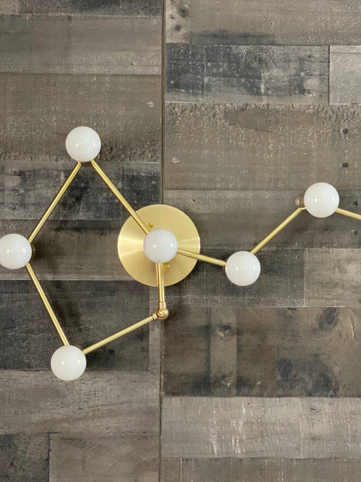 Virgo Zodiac 7-Light Modern Industrial Bathroom Vanity for wholesale by Lustrous Lumens