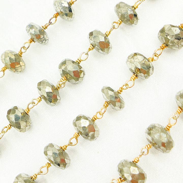 Tresor Jewelry Inc. - Wholesale Beaded Bracelet - Pyrite Rondel Faceted Gold Plated Wire Chain. PYR541