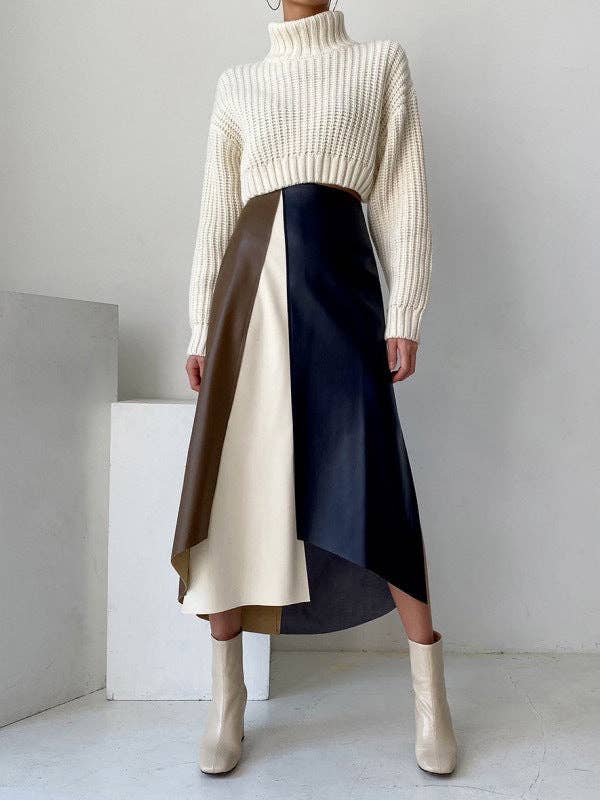 COLORÉ Jupe asymétrique à haut taille, coupe évasée, devant fendu et couleurs contrastées en vente sur Faire3