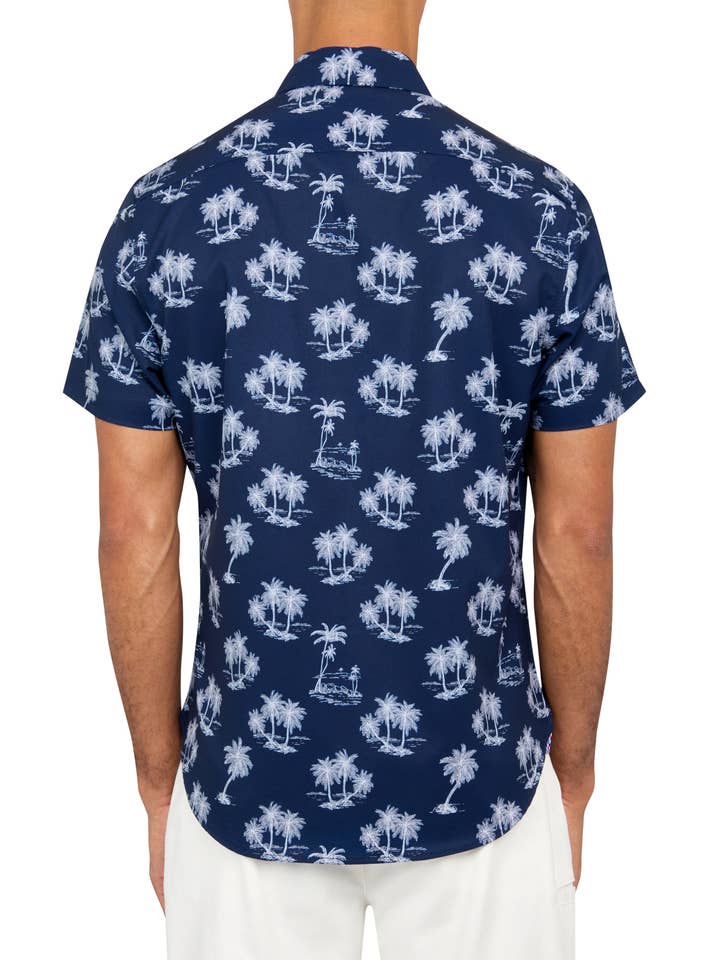 NAVY PALM TREES 4-WAY STRETCH RECYCLED SHORT SLEEVE SHIRT for wholesale on Faire