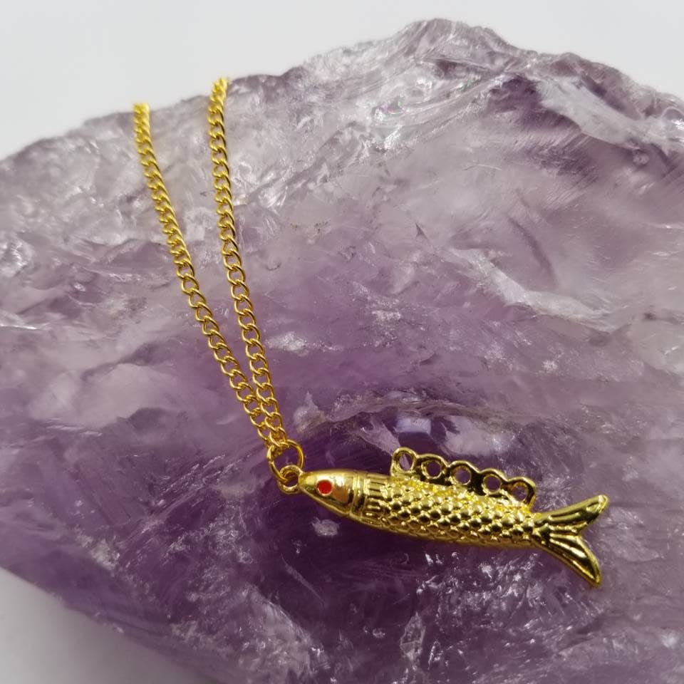 magnolia jewelry - Vente Colliers à pendentif - Collier avec pendentif en forme de poisson en or1