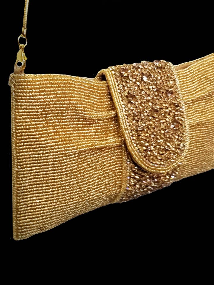 FIOCCO POCHETTE CON PERLINE #10485 per la vendita all'ingrosso da parte di Ricki designs