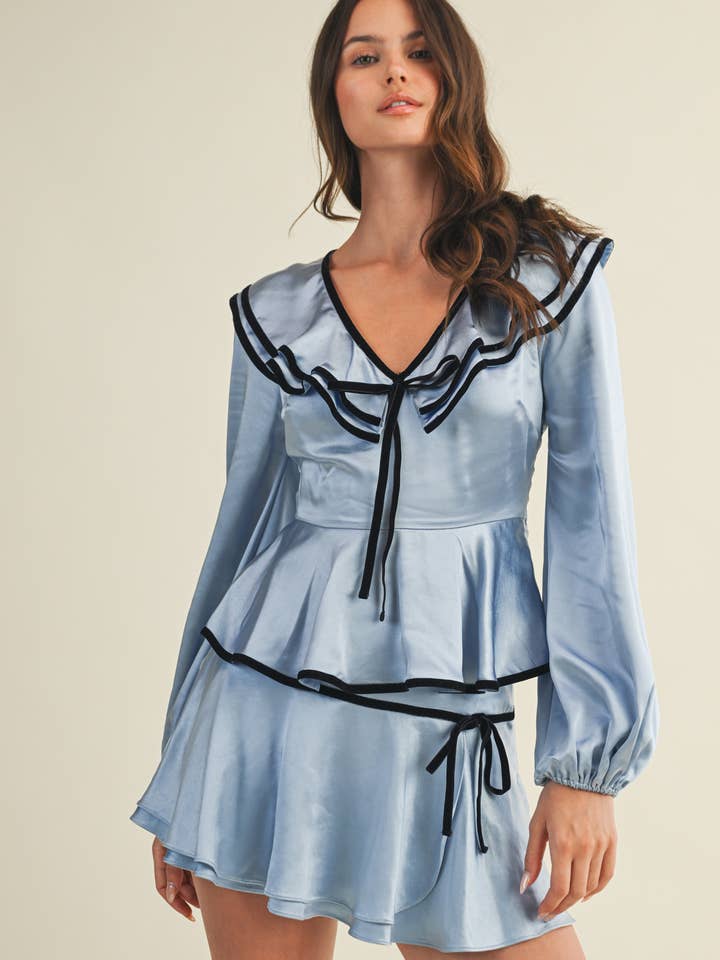 V-AUSSCHNITT-BLUSE MIT SCHLEIFE UND RÜSCHEN-PEPLUM für den Großhandel von Mustard Seed