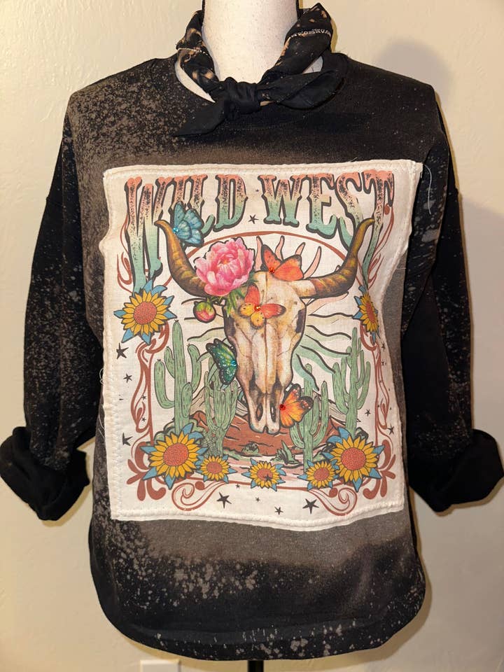 Wild West Skull cream patch on S.Bleached Black Sweatshirt for wholesale by Bling-A-GoGo, LLC