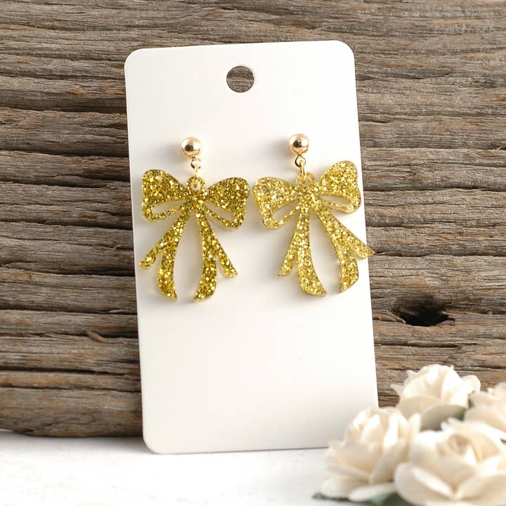 Gold Glitter Bow Dangle Post - Acrylic - Christmas Earrings for wholesale by Rocky Mountain Shops