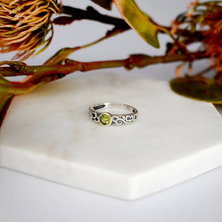 Betsy peridot facet Celtic style ring for wholesale by Kali Ma Designs - Sterling Silver Jewellery