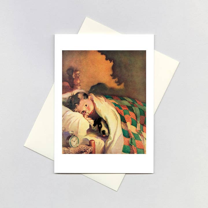 Biglietto di Natale con il ragazzo e il suo cane che guarda Babbo Natale per la vendita all'ingrosso da parte di Laughing Elephant