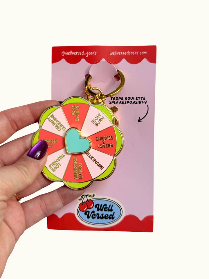 Spinning Bookish Keychain | Romance Reader Trope Roulette for wholesale by Well Versed Goods