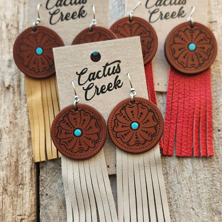 "Montana" Handmade Tooled Leather and Fringe Earrings for wholesale by Cocklebur & Co.