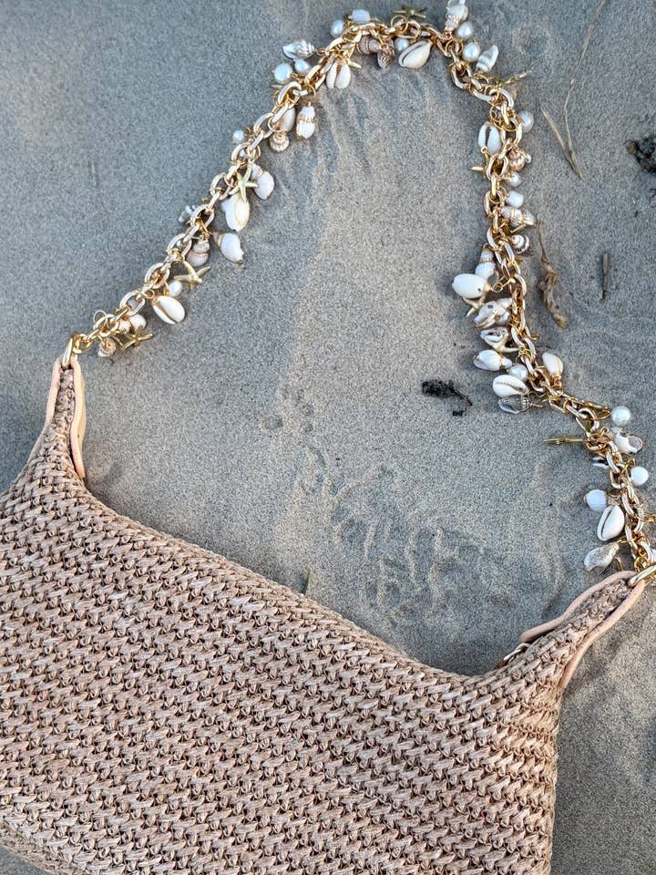 Coastal Chic Woven Purse with Shells and Gold Plated Charms for wholesale by Serendipity Designs