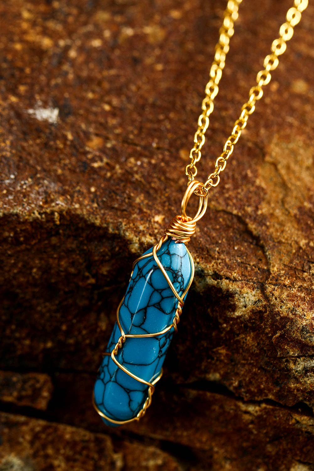 Bleu Collier pendentif turquoise enroulé de fil d'or bleu en vente sur Faire3