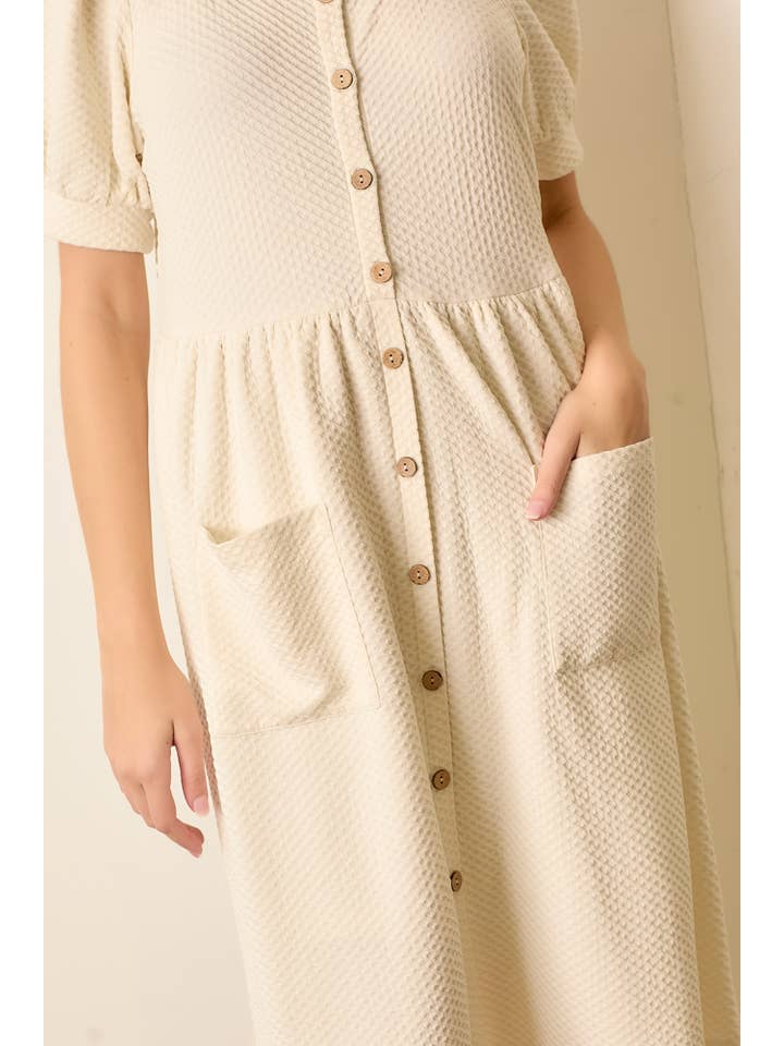 CREAM ROUND NECK BUTTON UP DRESS W POCKET for wholesale on Faire2