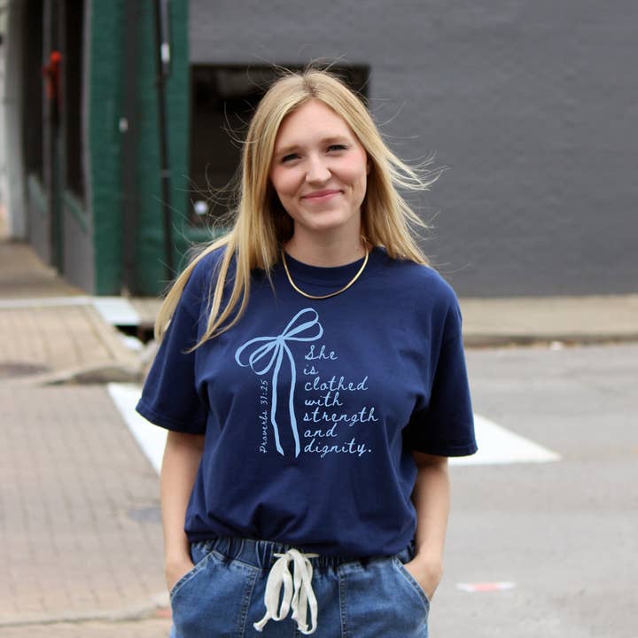 SHE IS CLOTHED WITH STRENGTH AND DIGNITY UNISEX TEE for wholesale by Dwell Apparel