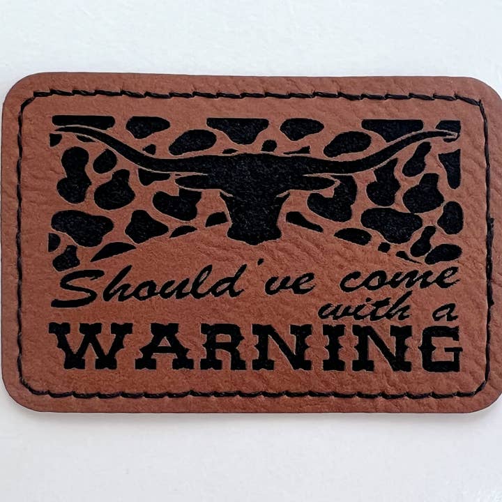 Leather Hat Patch Should've Come With A Warning for wholesale by Hometown Co. Wholesale