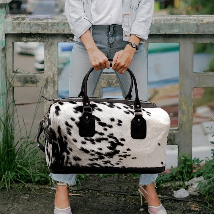 Walter Flux Black & Tan Cowhide Duffle Bag |Ventinots for wholesale by ventinots