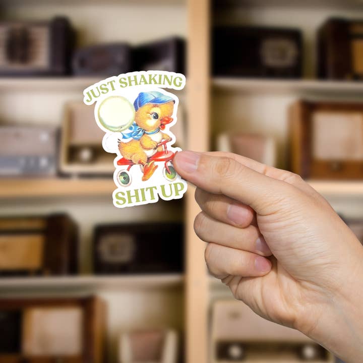 JUST SHAKING SHIT UP Sticker for wholesale by dkhandmade