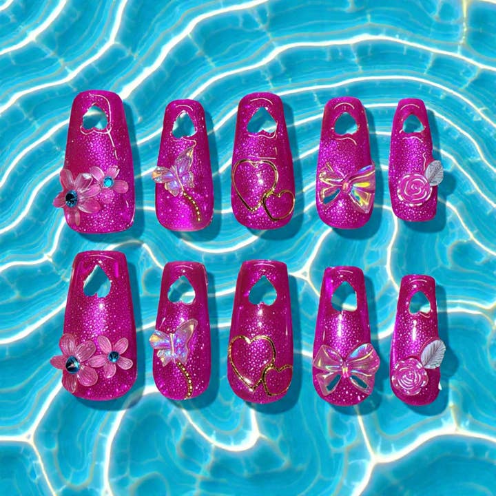 Magenta pink coffin nails with cutout hearts for wholesale by OVER THE TOP NAILS