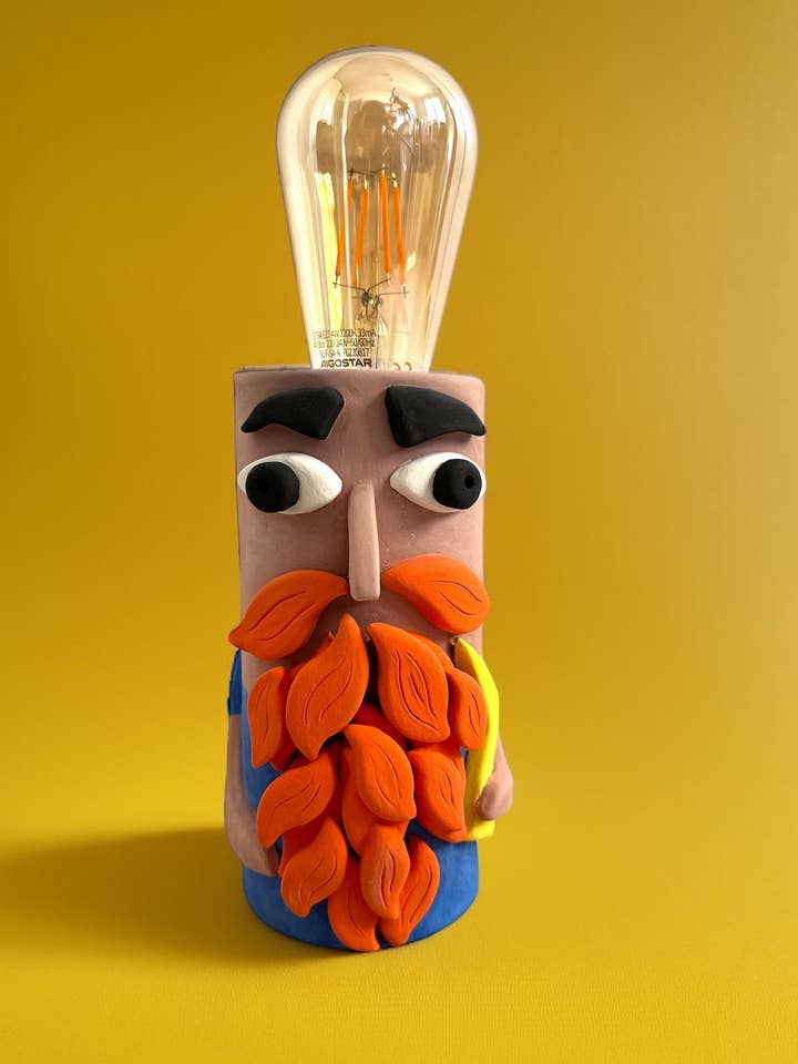 La lampada in ceramica del Fishkeeper for wholesale by Thetis Art Studio