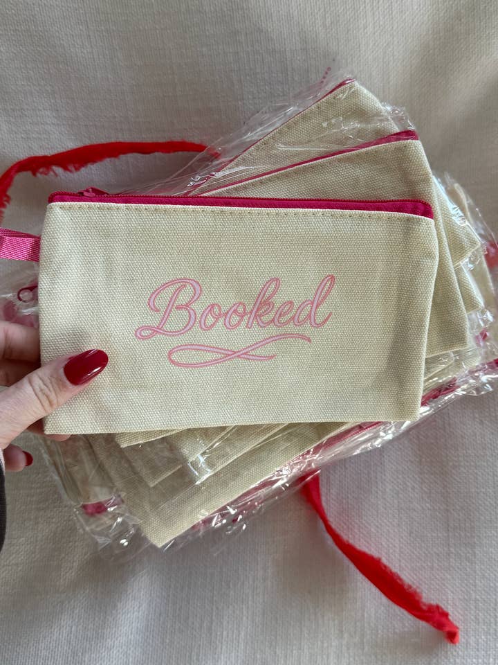 Booked 📚 Mini Bookish Zipper Pouch for wholesale by Well Versed Goods