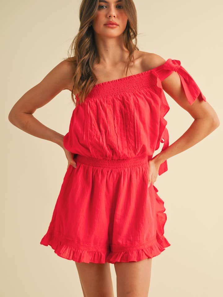 IR2199 RUFFLE HEM ROMPER WITH ONE SHOULDER TIE DETAIL for wholesale by Klesis