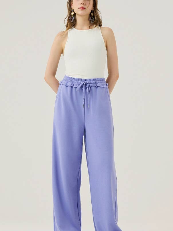 INP1006 Calças de Treino de Pernas Largas com Bainha Desfiada -12pcs $6.99 por atacado de noflik