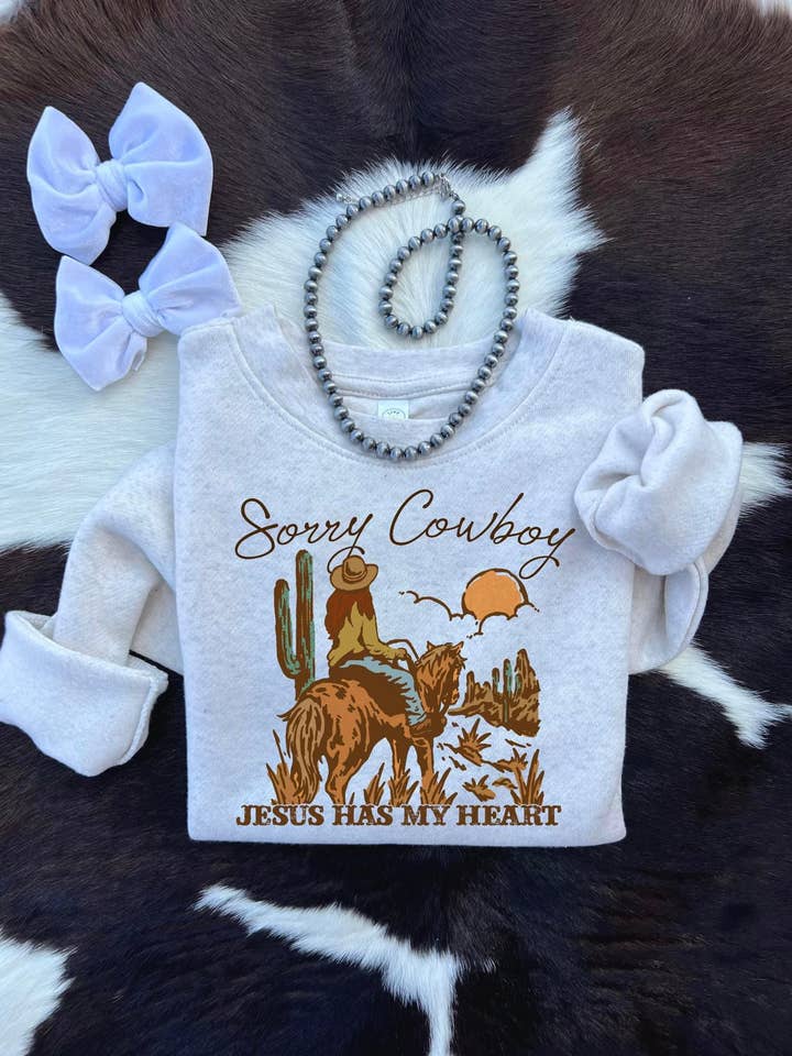 Sorry cowboy (sweatshirt) for wholesale by Buckin Baby Wholesale